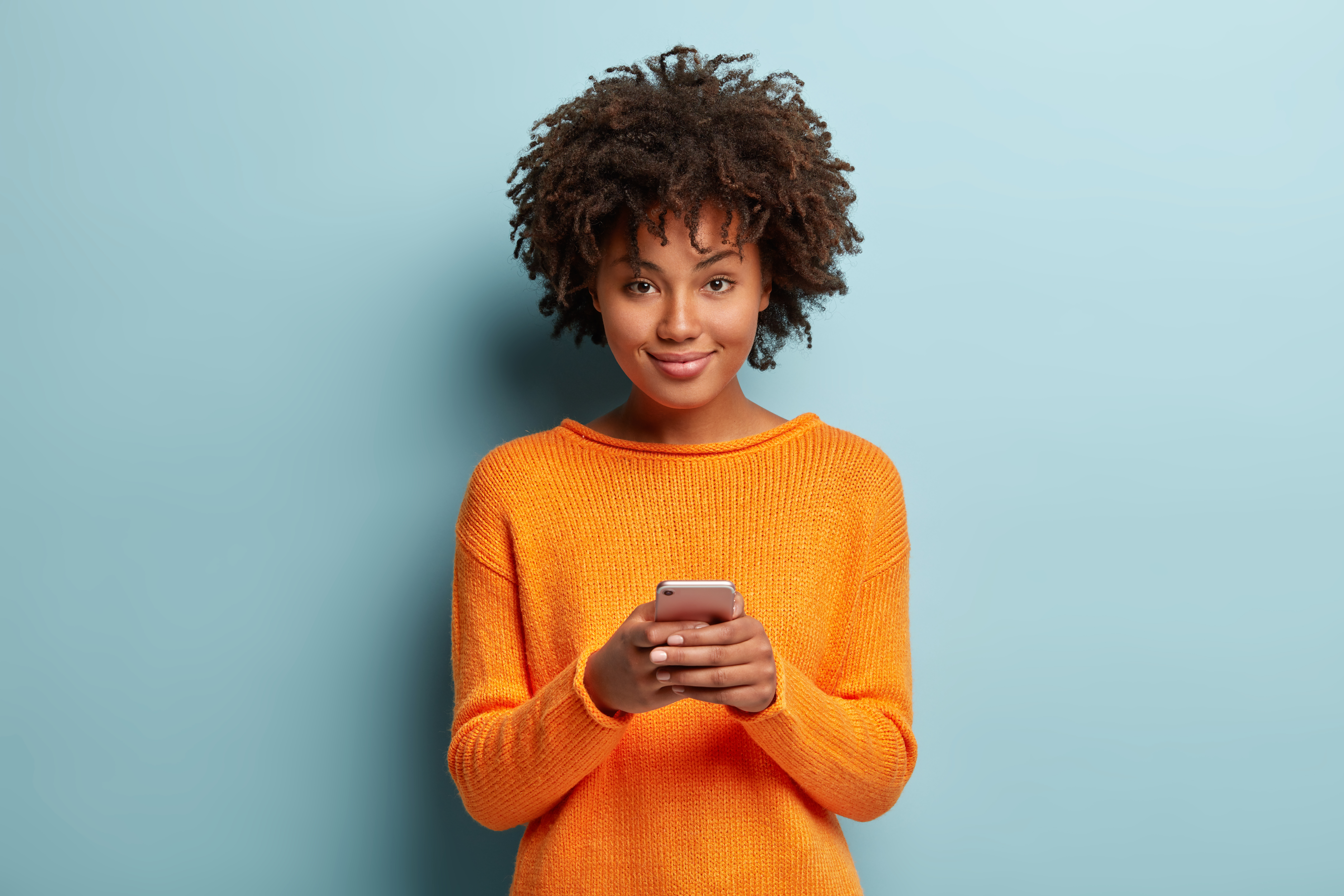 Isolated,Shot,Of,Positive,Smiling,Woman,Holds,Modern,Cellular,,Enjoys